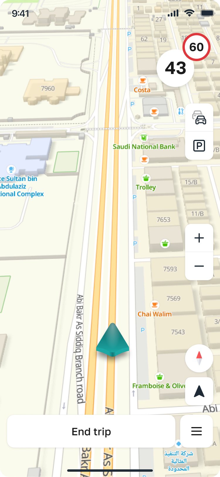Active turn-by-turn navigation with parking icon visible